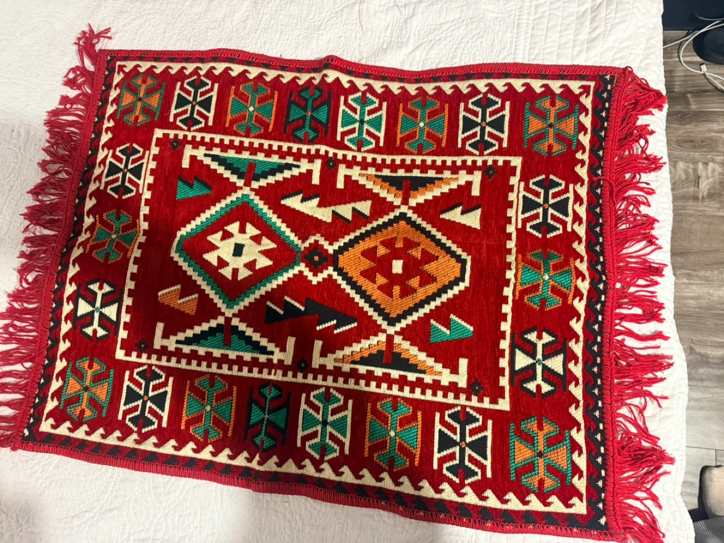 Red Woven Tapestry with Geometric Patterns
