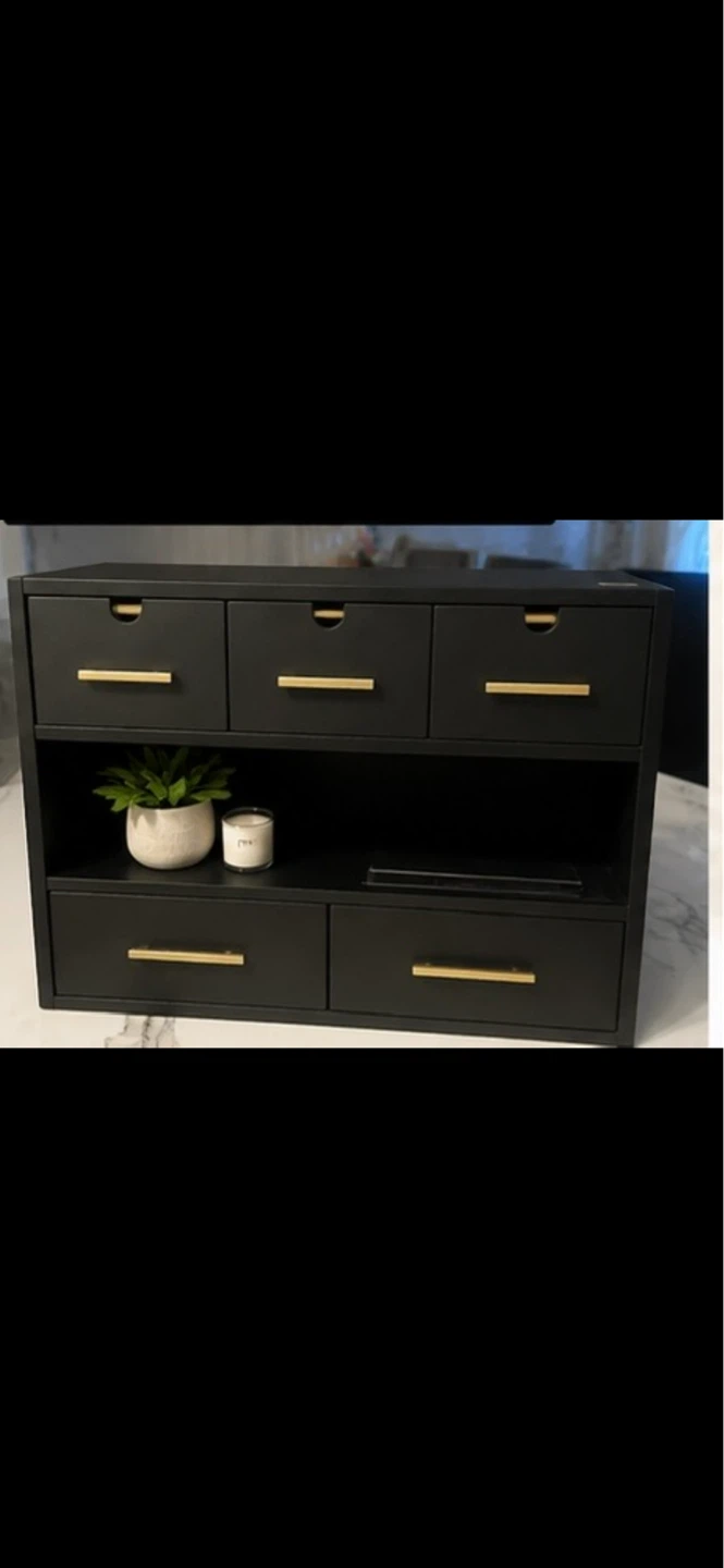 Black organizer with drawers and shelf