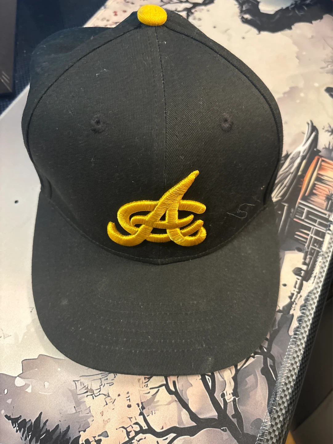Black Baseball Cap with Yellow "A" Logo
