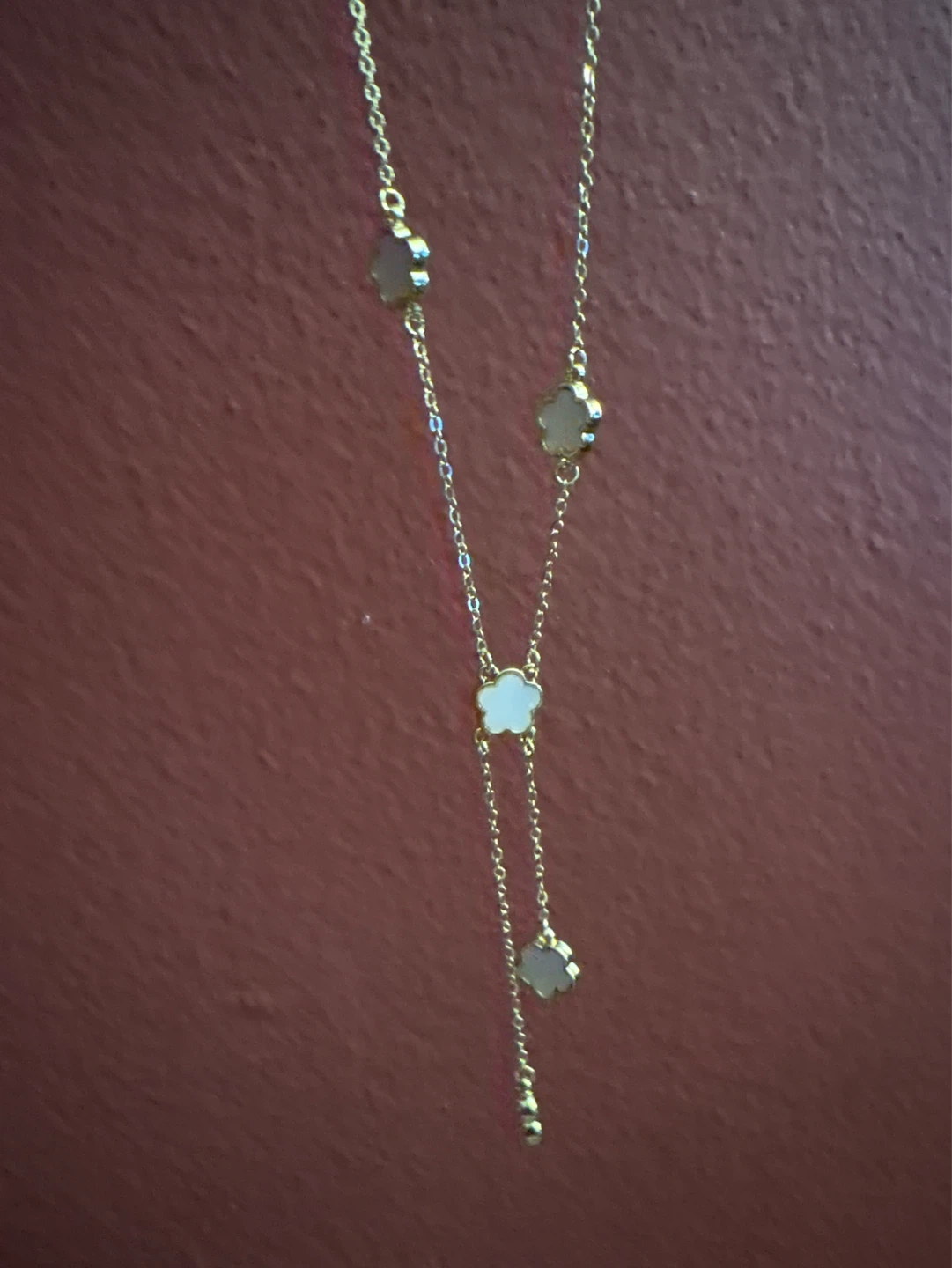 New Gold tone necklace with white clover charms