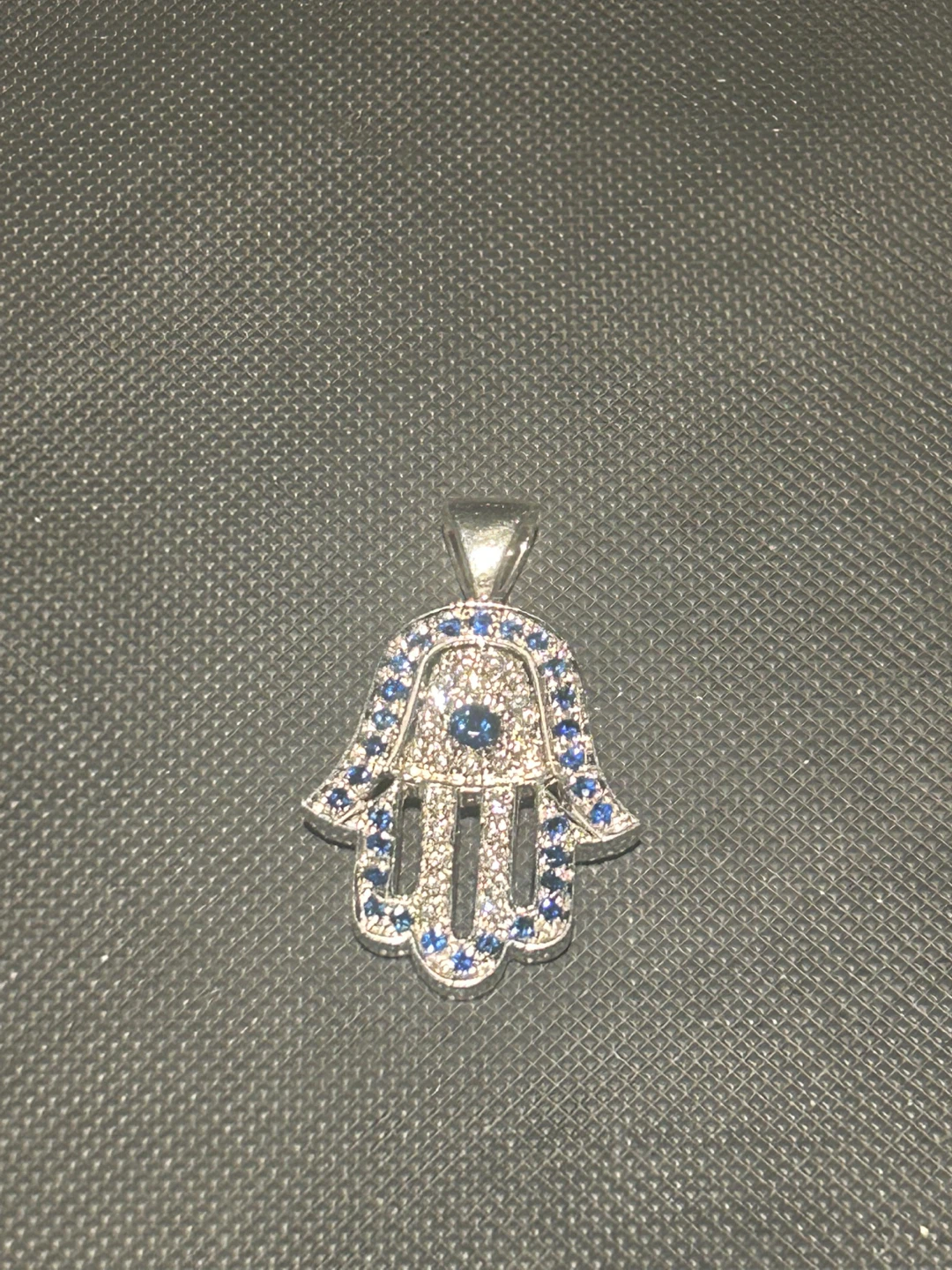 Tiffany and co Hamsa Hand Pendant with Blue and Clear Stones