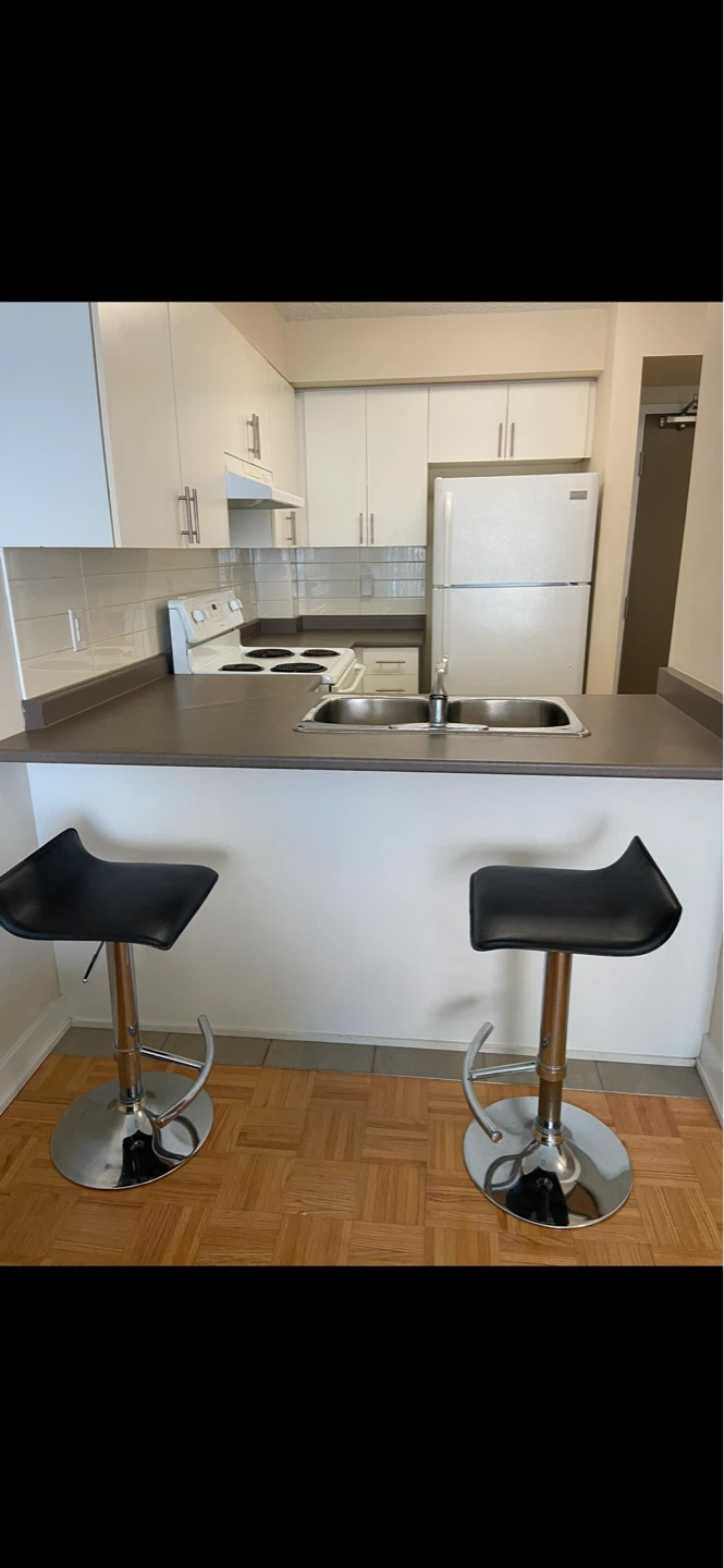2 Black Adjustable Bar Stools with Chrome Base