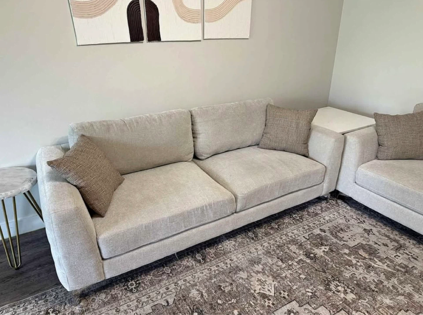Light Beige Sectional Sofa with Pillows