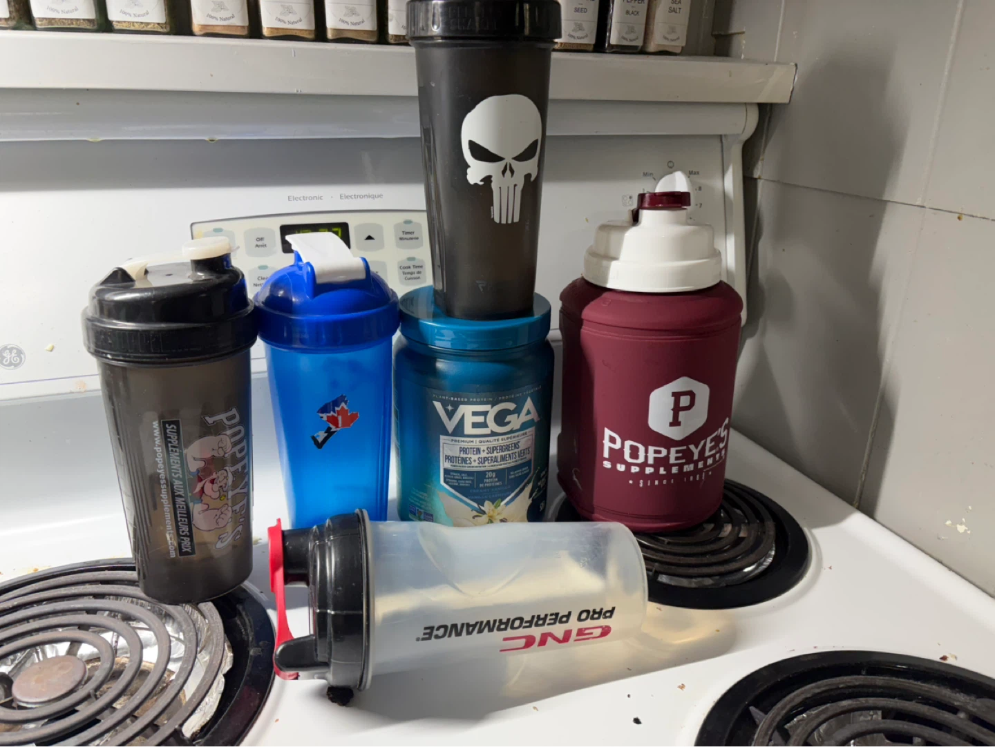 Assorted Shaker Bottles and Vega Protein