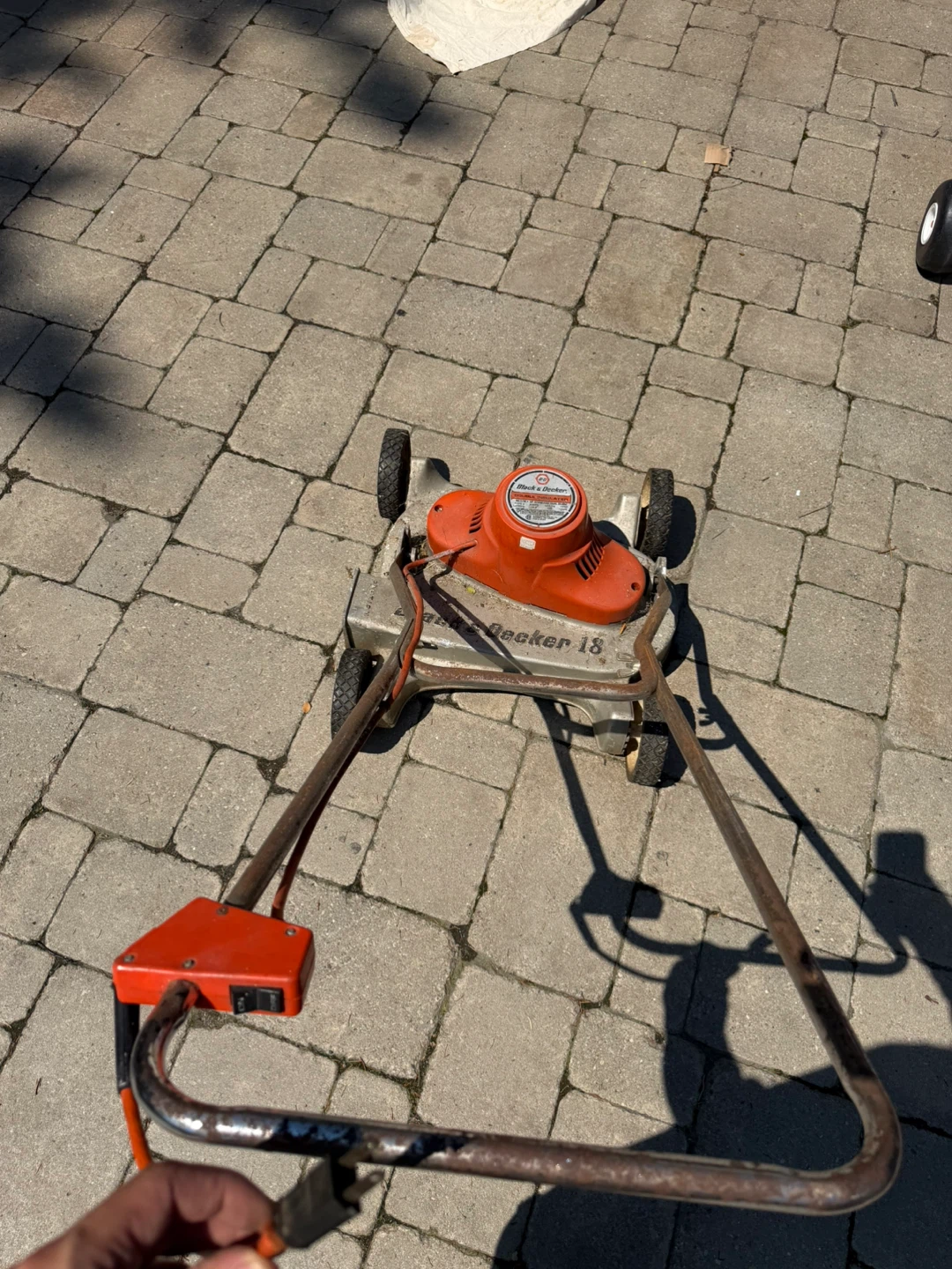 3 String Trimmers and 1 lawn Mower