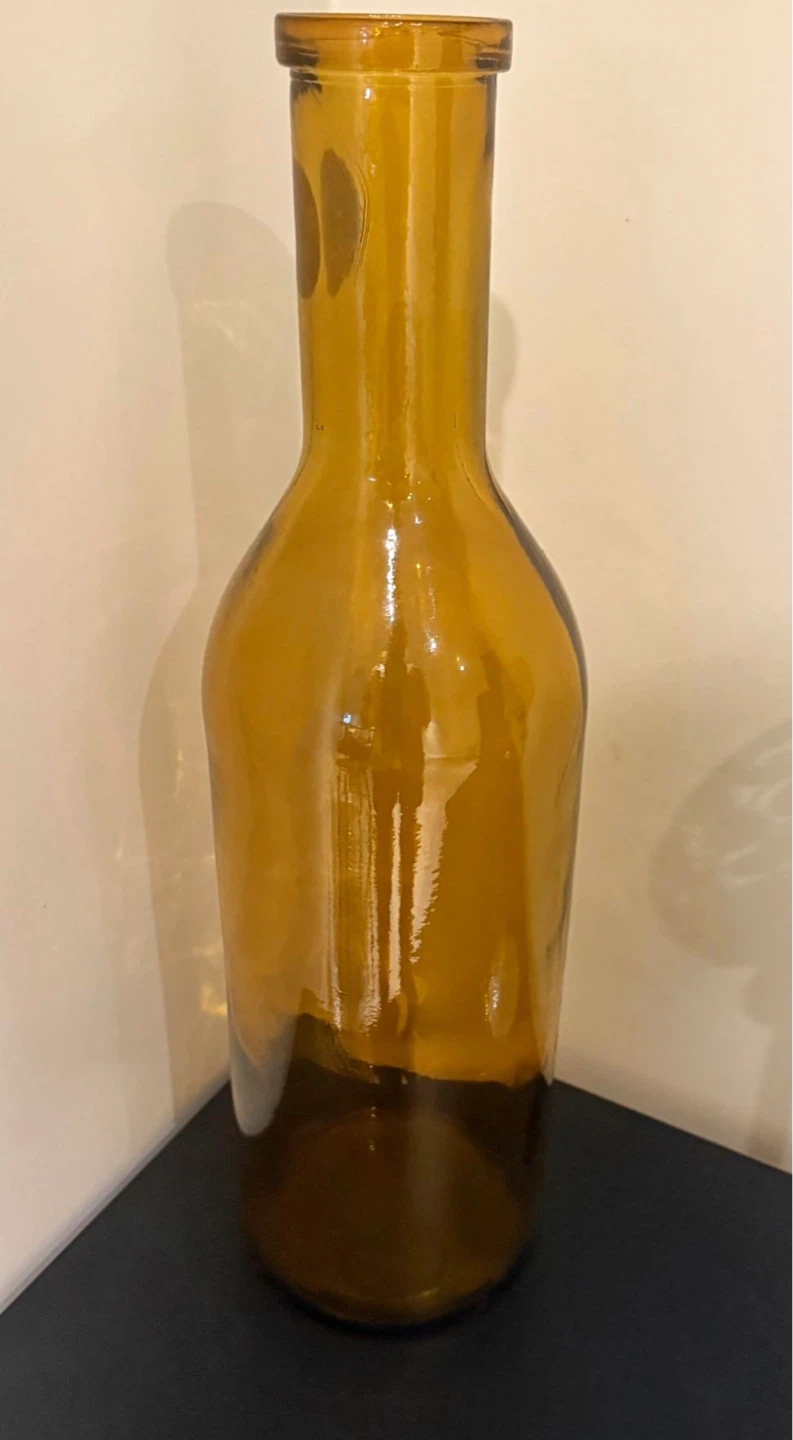 Amber glass bottle vase