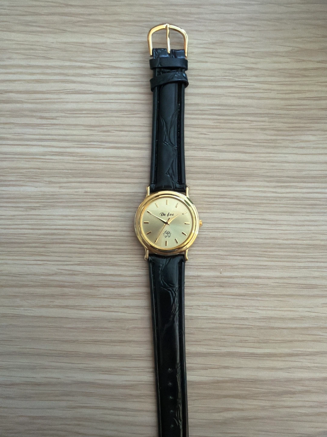 De foe Gold Tone Watch