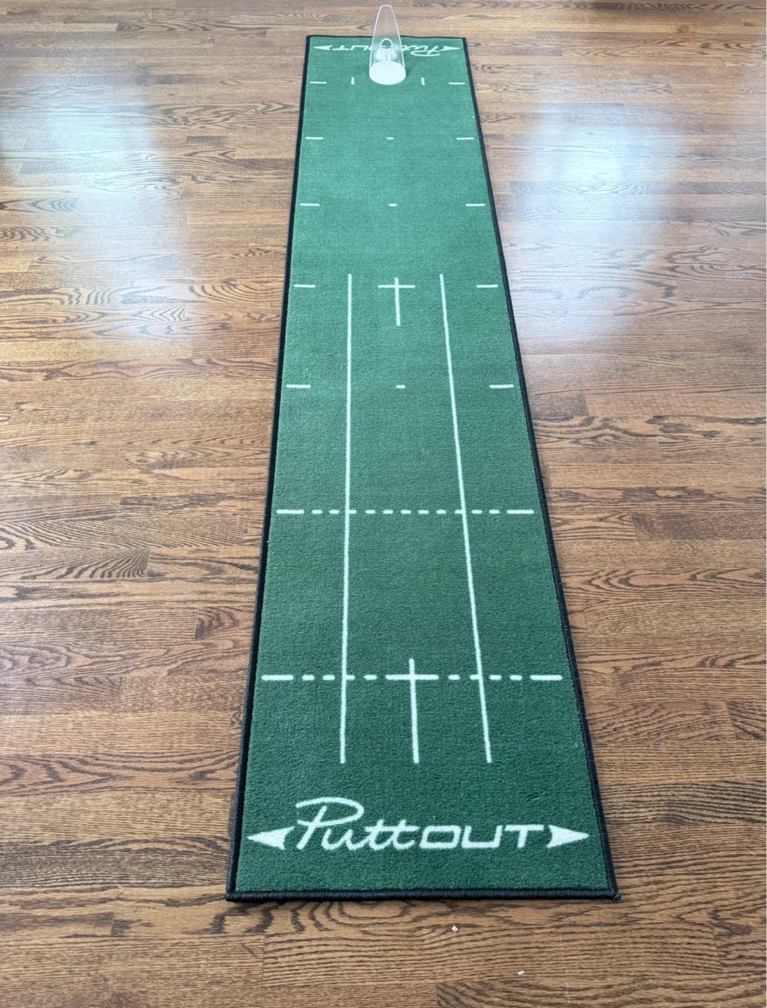 PuttOUT Golf Putting Mat with pressure trainer