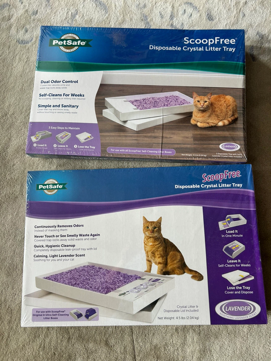 Two disposable cat litter trays