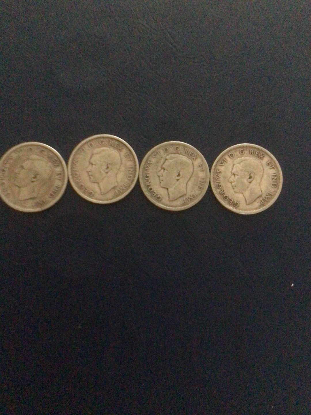 Four Canadian 25 Cent Coins 1940’s