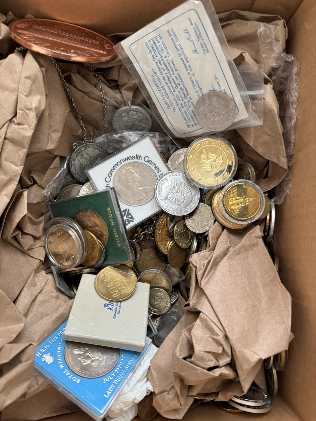 Random box of coins and tokens. Nothing valuable likely