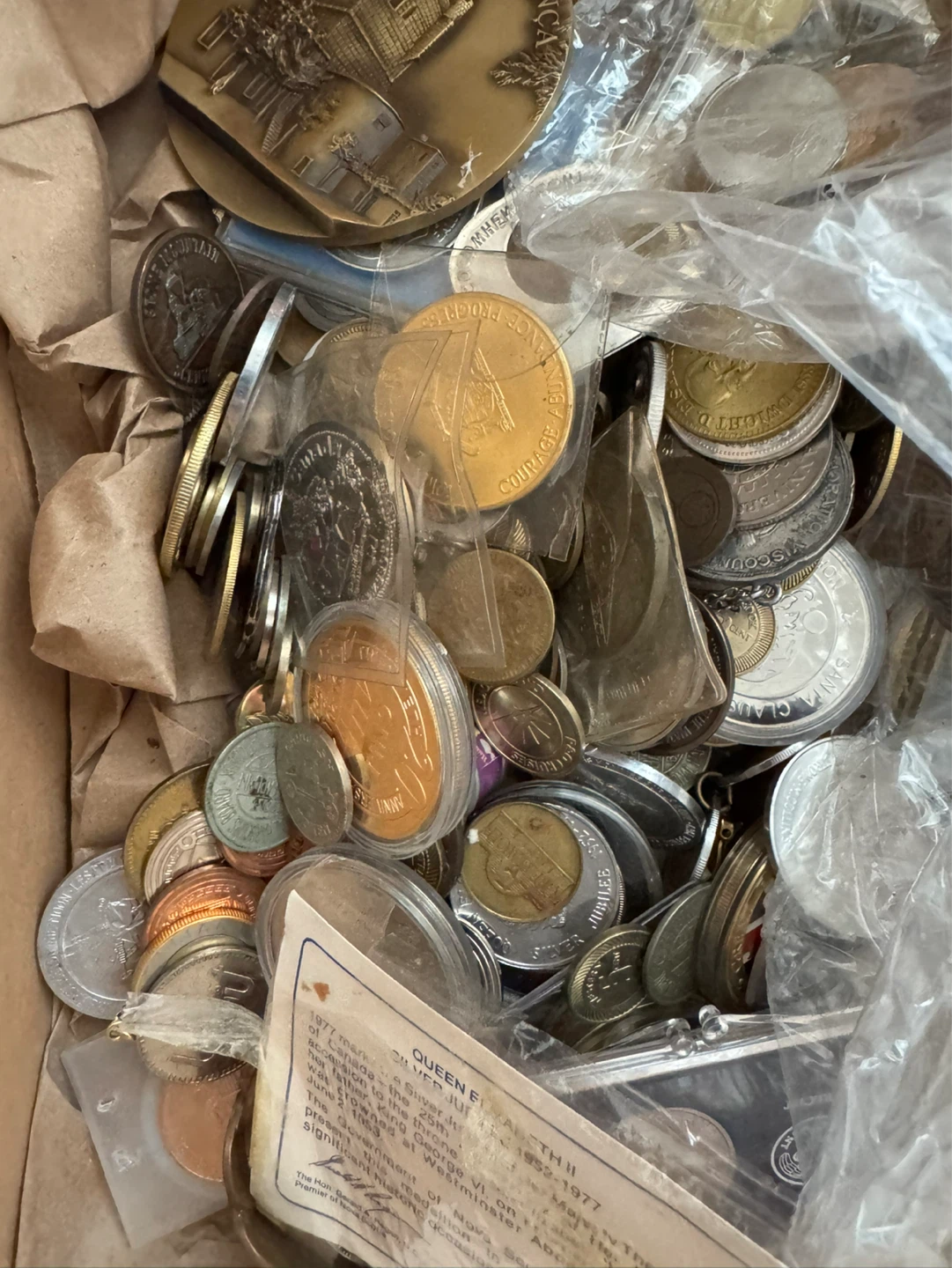 Random box of coins and tokens. Nothing valuable likely - photo 3