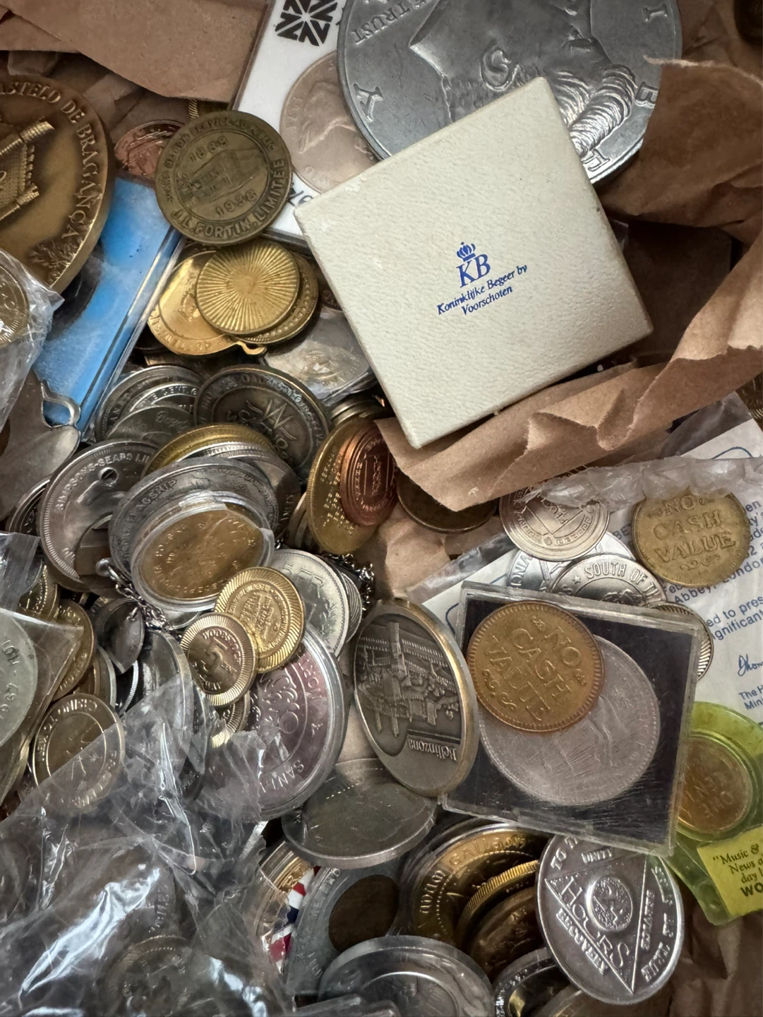 Random box of coins and tokens. Nothing valuable likely - photo 4