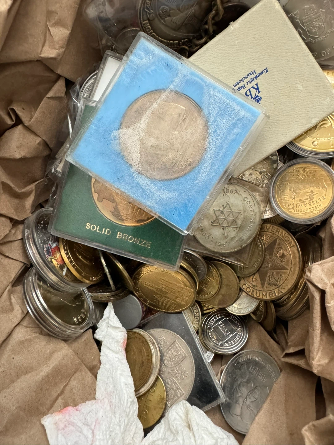 Random box of coins and tokens. Nothing valuable likely - photo 2