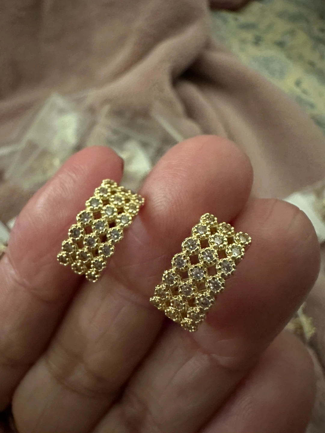 Gold tone hoop earrings with small stones
