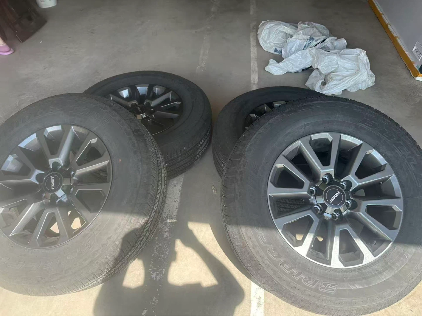 Set of 4 Bridgestone Tires with Rims(price is negotiable )