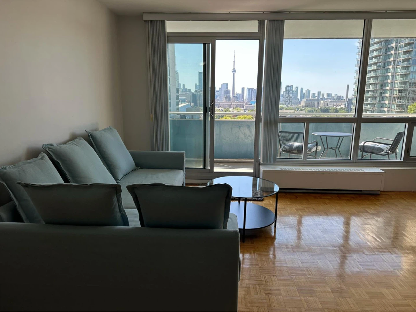 Light blue corner sofa-bed with lots of storage