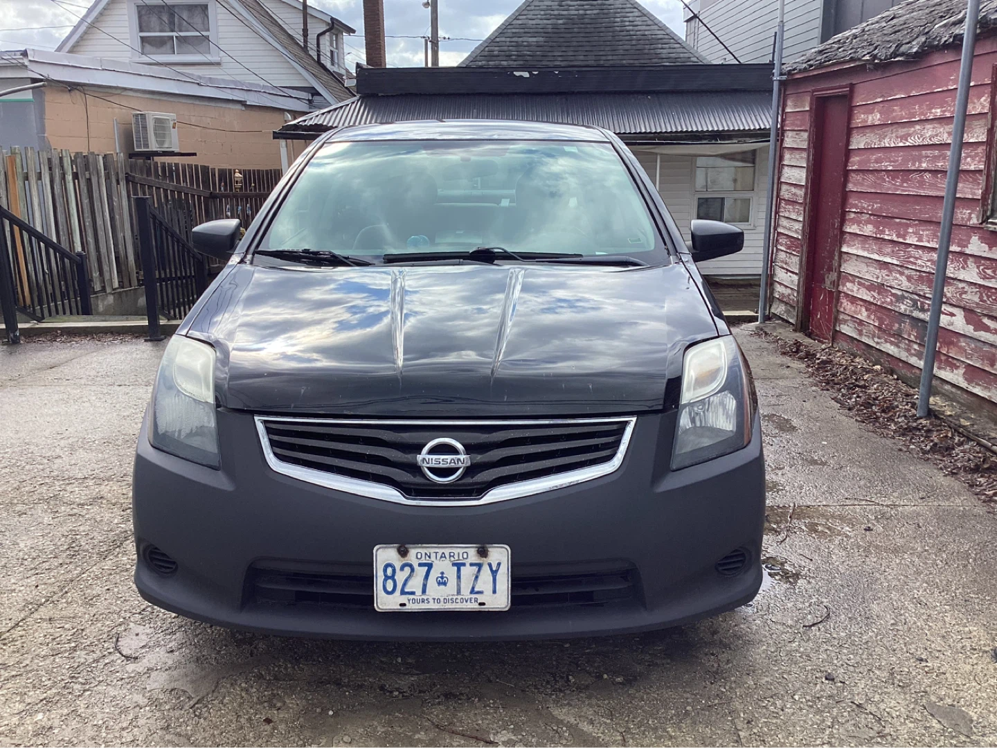 Black Nissan Sentra SR Sedan
