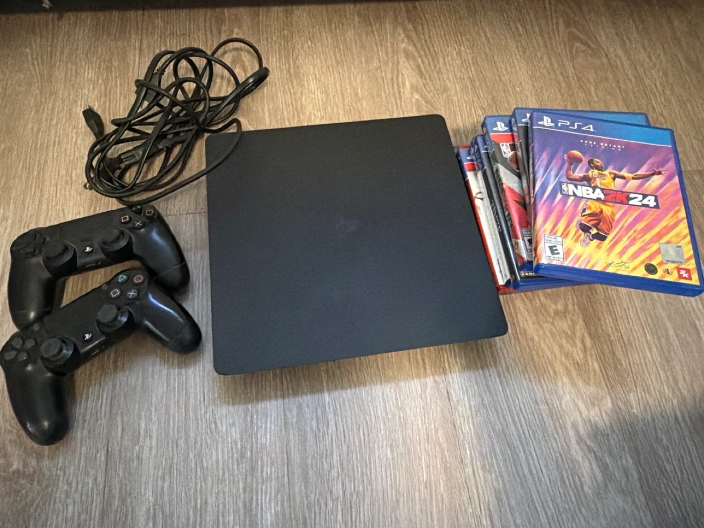 PlayStation 4 Slim Console with 2 Controllers and Games