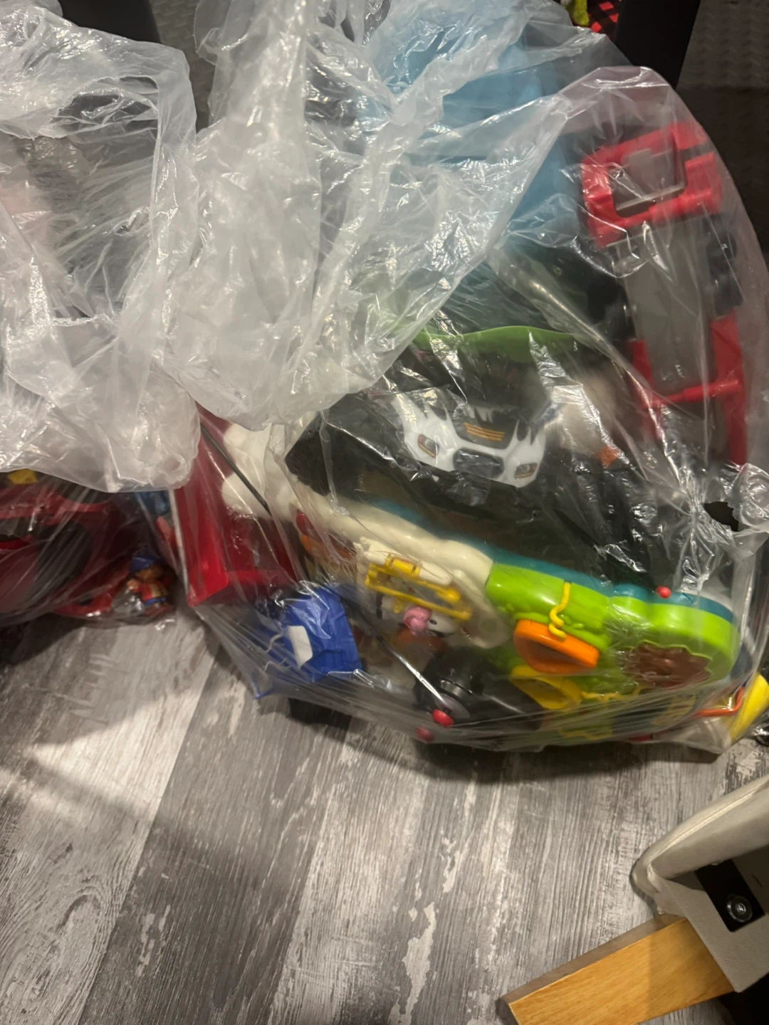 Bag of assorted toy vehicles and figures - photo 2