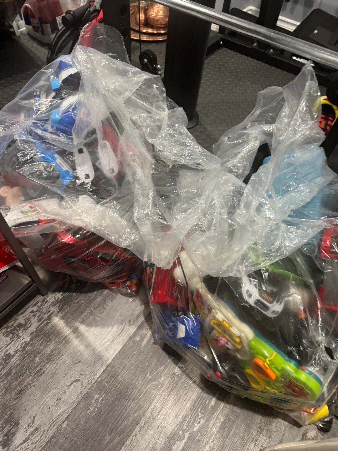 Bag of assorted toy vehicles and figures