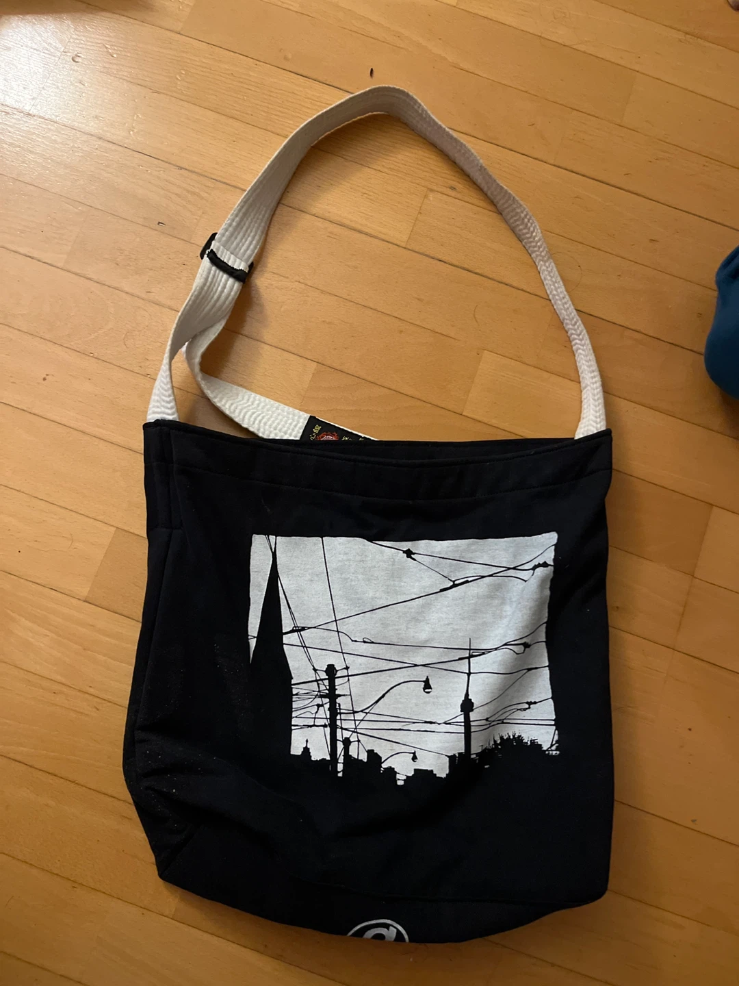 Black Canvas Shoulder Bag with Cityscape Graphic