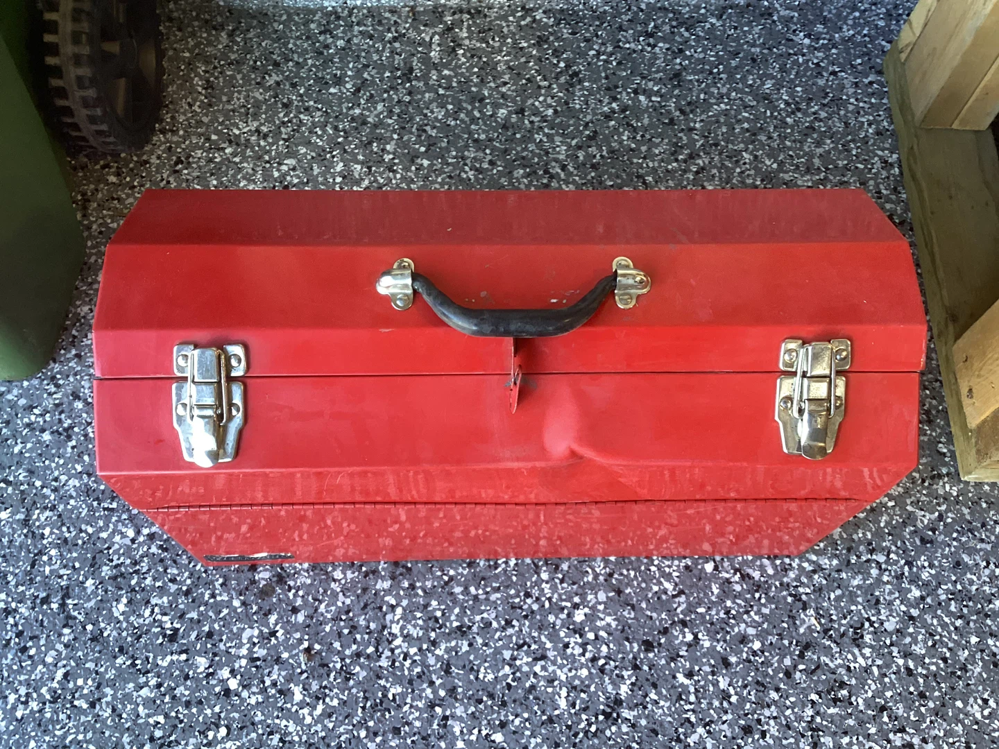 Red Metal Toolbox with Assorted Tools
