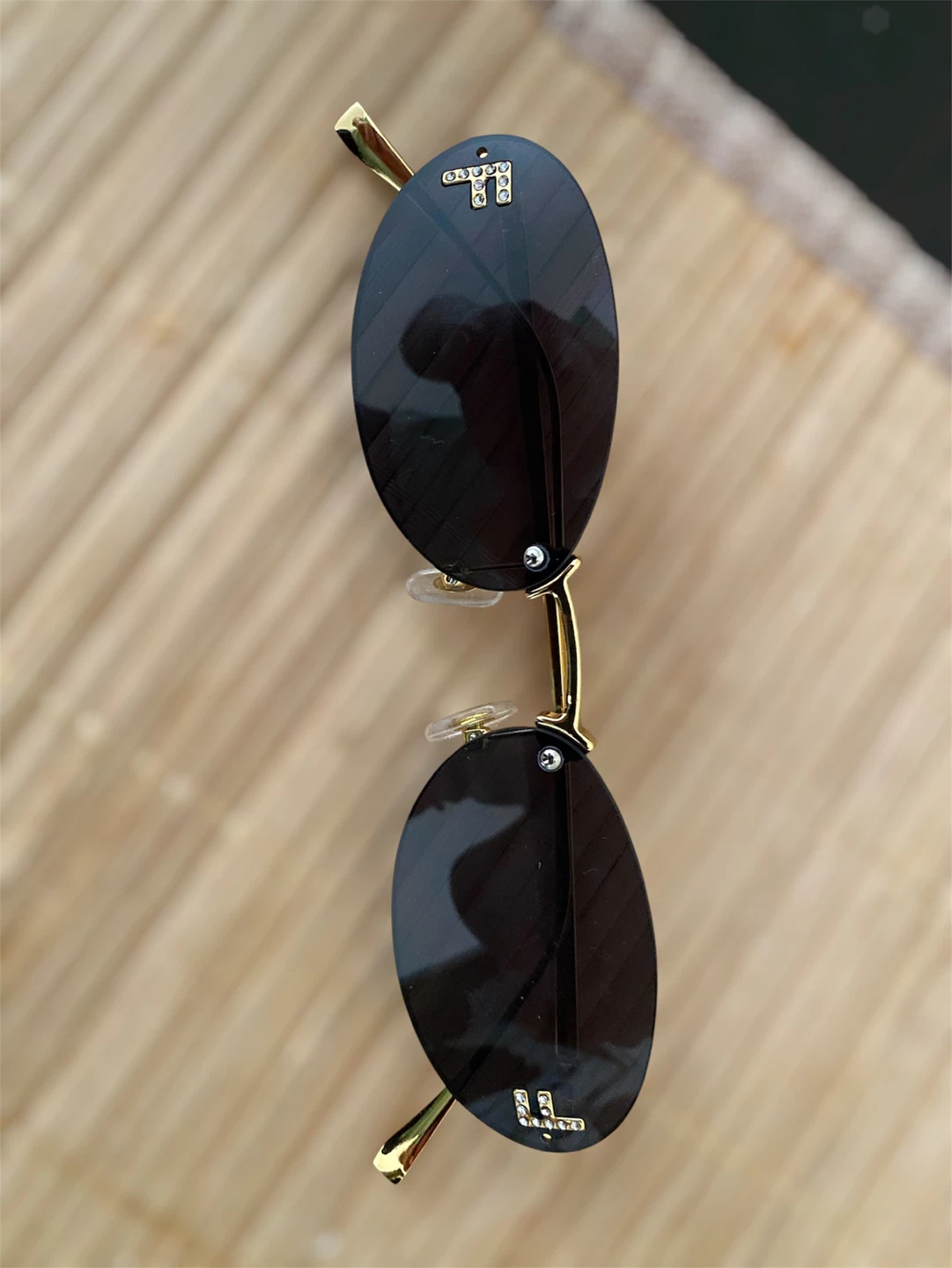 Stylish black lens gold frame sunglasses