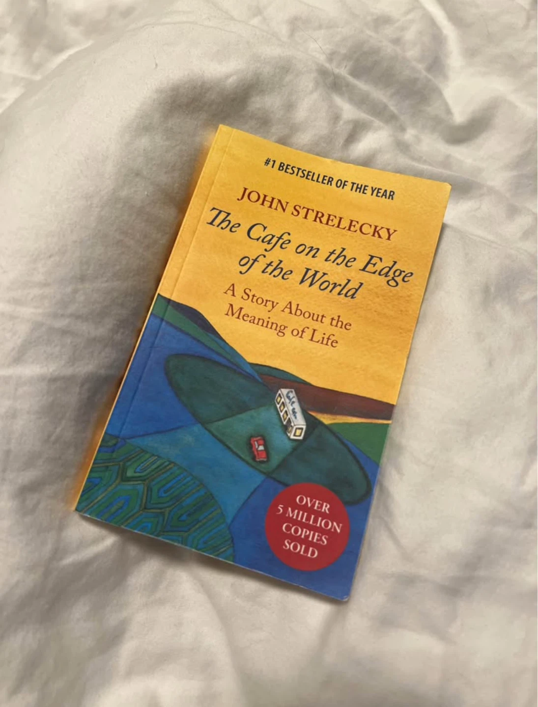 The Cafe on the Edge of the World by John Strelecky Book