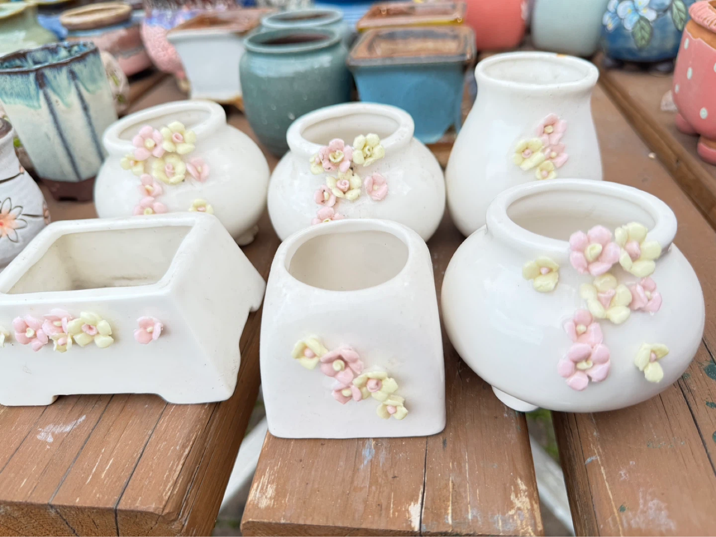 White Ceramic Planter with Pink and Yellow Flowers
