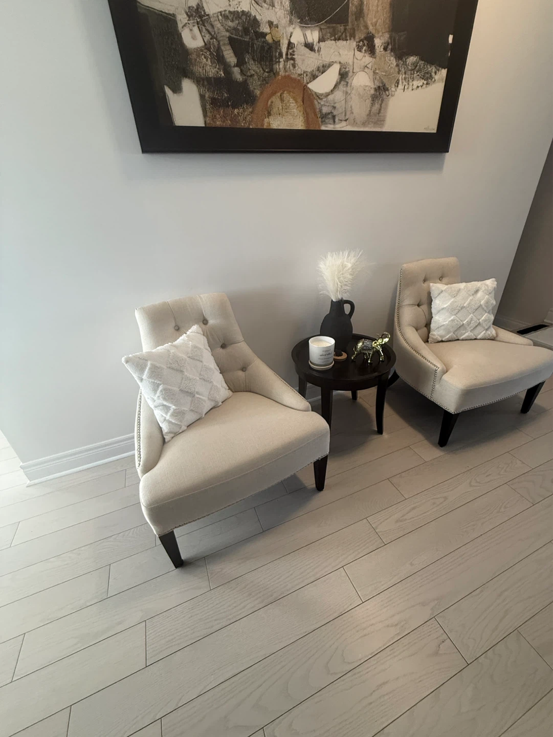 Cream pair of Tufted Accent Chairs with Studded Trim