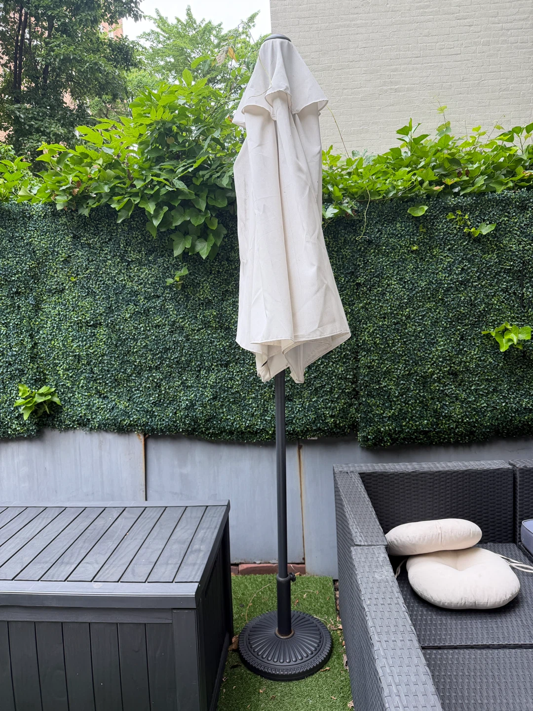 Cream Patio Umbrella with Black Pole and Base