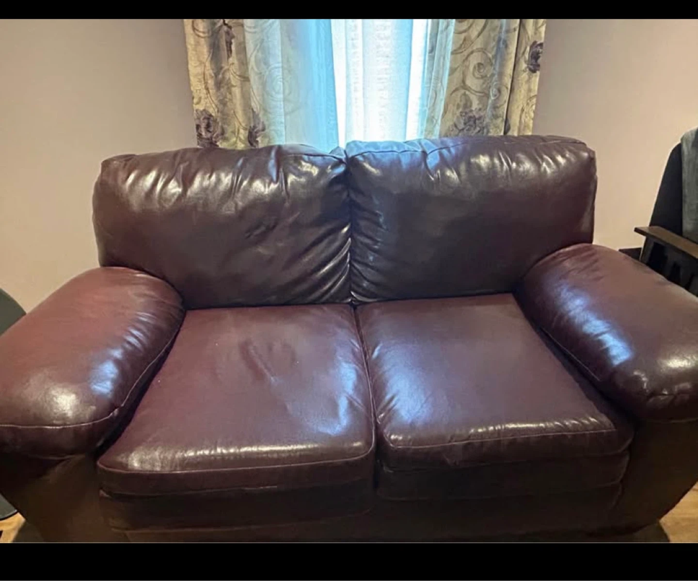 Brown Maroon Leather Loveseat
