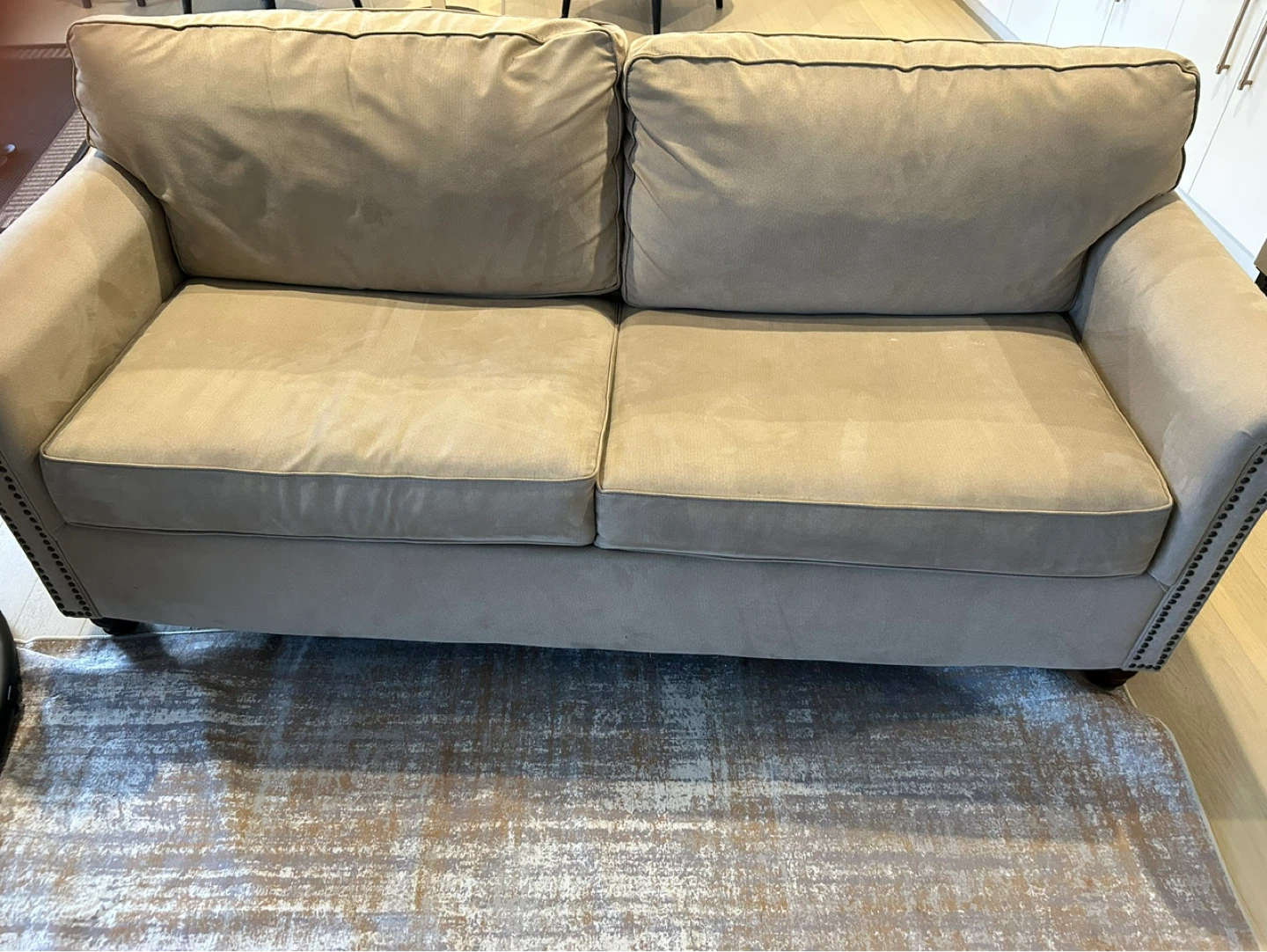 Tan Sofa cum bed with Nailhead Trim