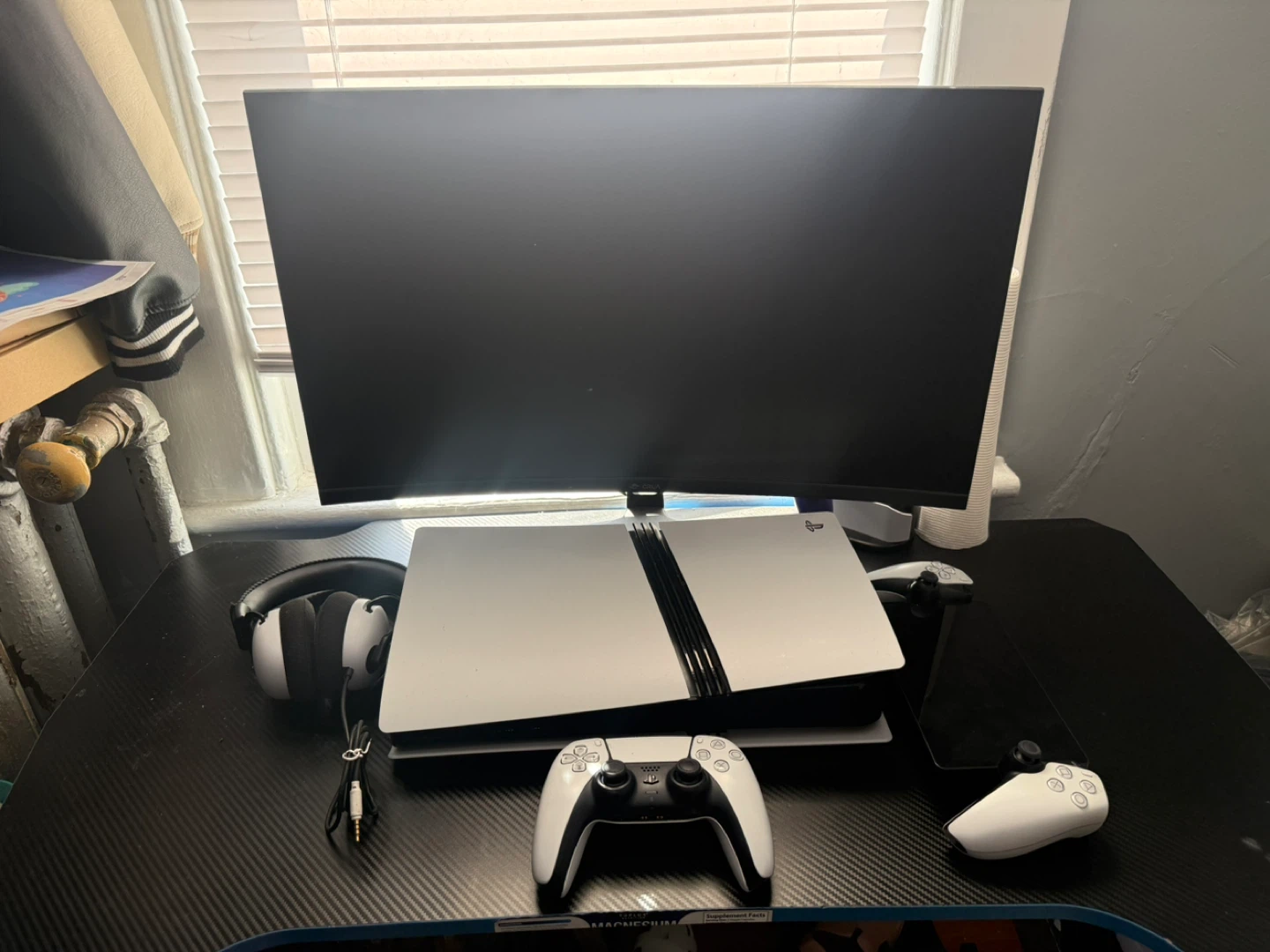 PlayStation 5 Console with Two Controllers and Headphones