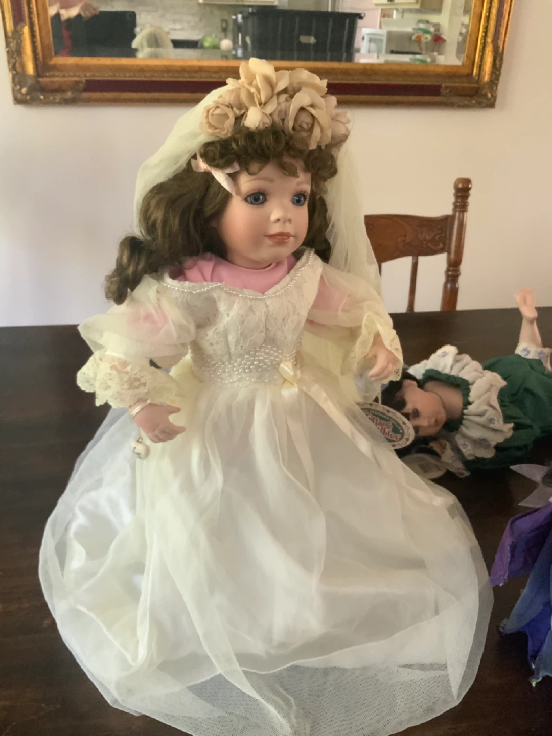Collection of Porcelain Dolls in Various Outfits - photo 2