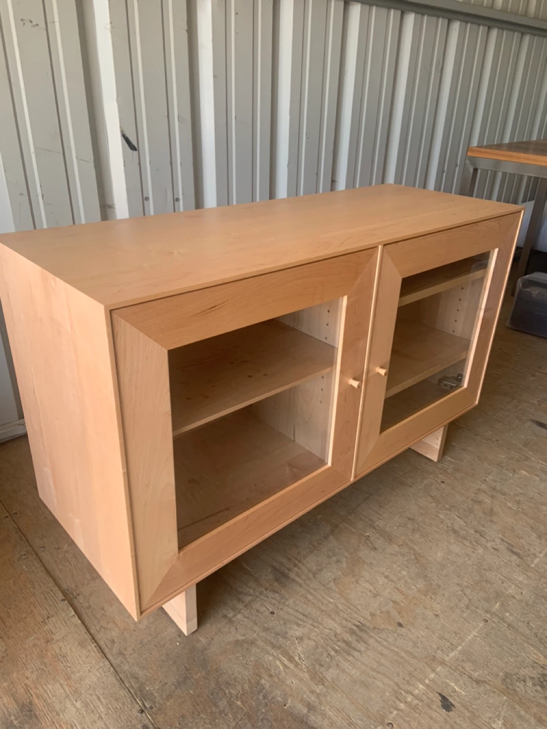Light Wood Cabinet with Glass Doors