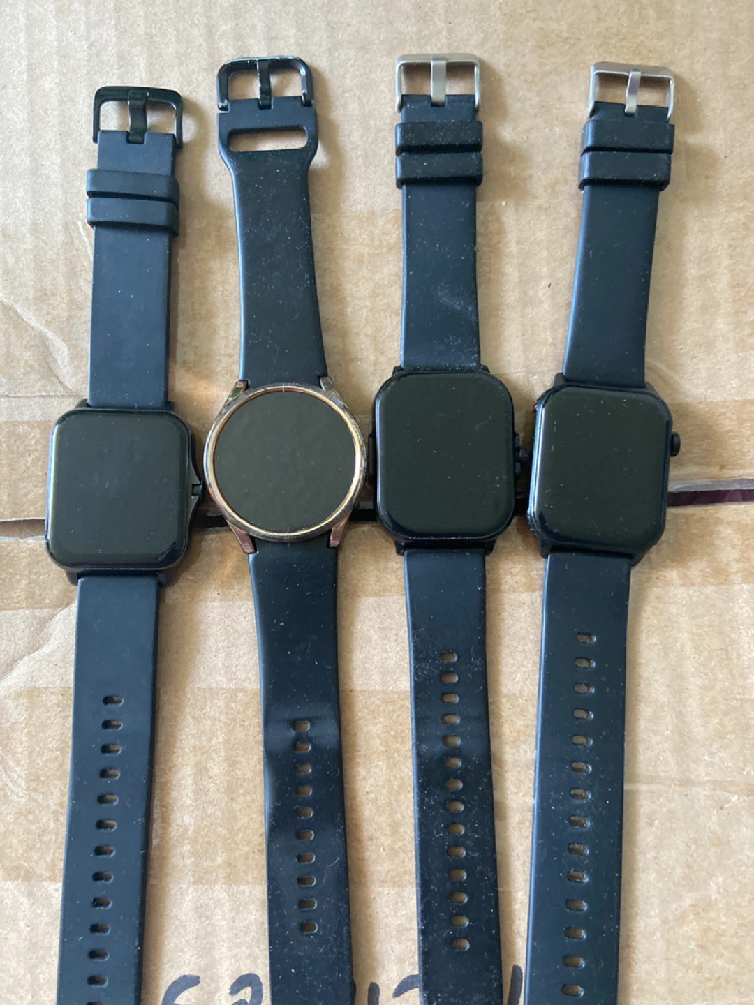 Four Black Smartwatches