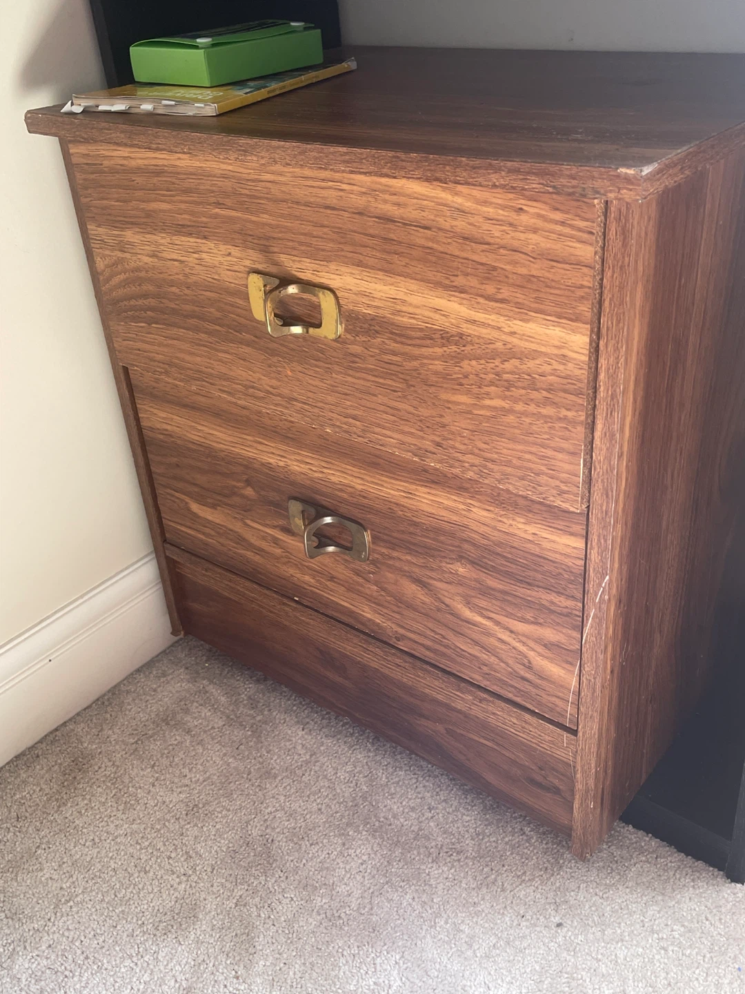 Two-drawer wooden nightstand with brass pulls