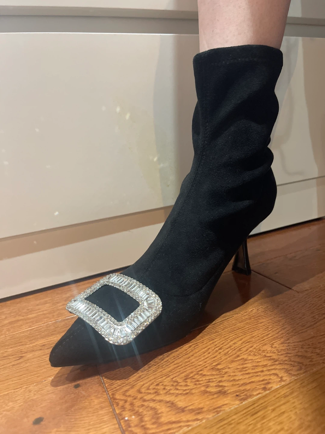 Black ankle boots with rhinestone buckle
