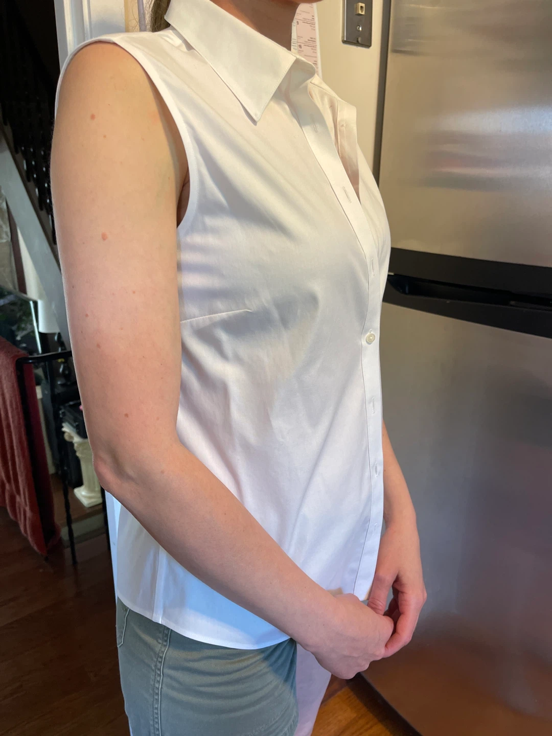 White Sleeveless Button-Up Shirt