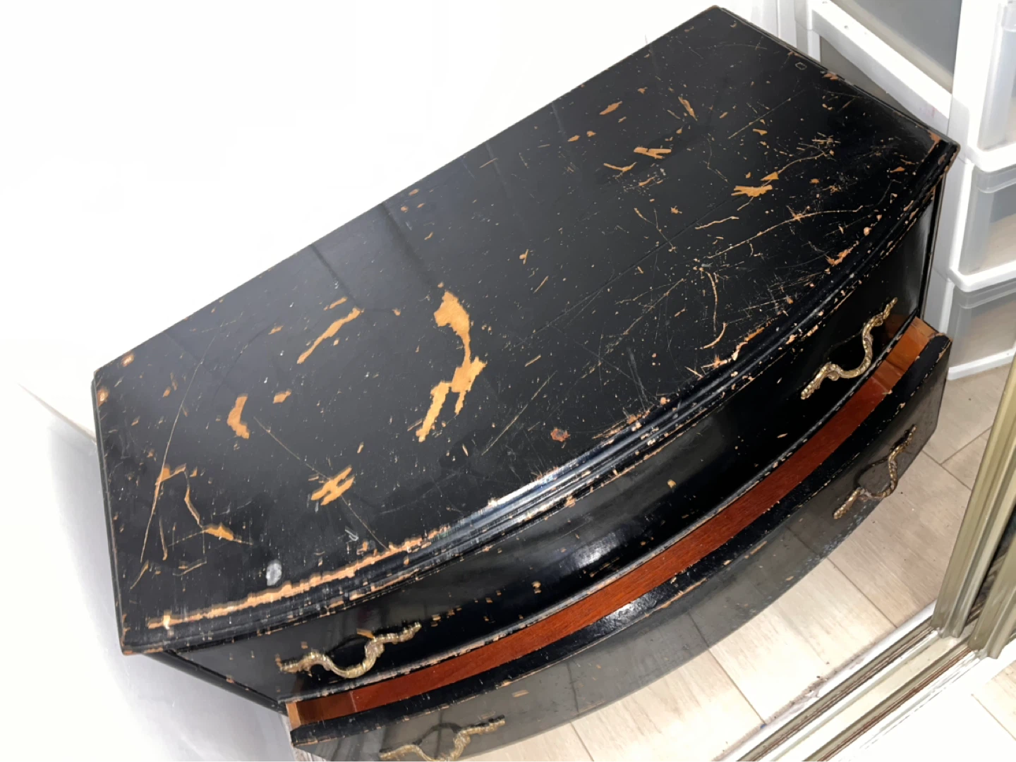 Black curved dresser with ornate handles - photo 2