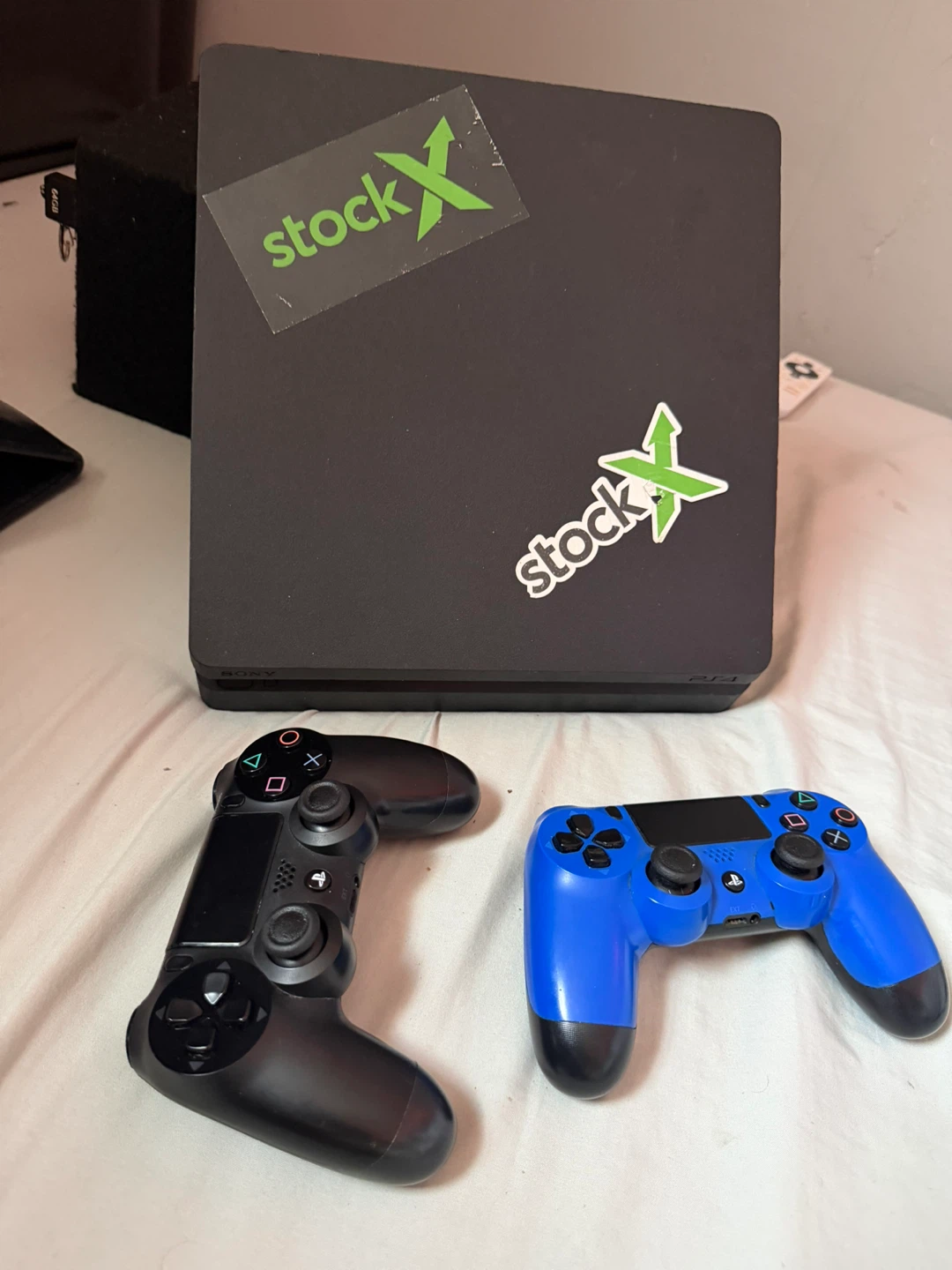 PlayStation 4 Slim Console with 2 Controllers