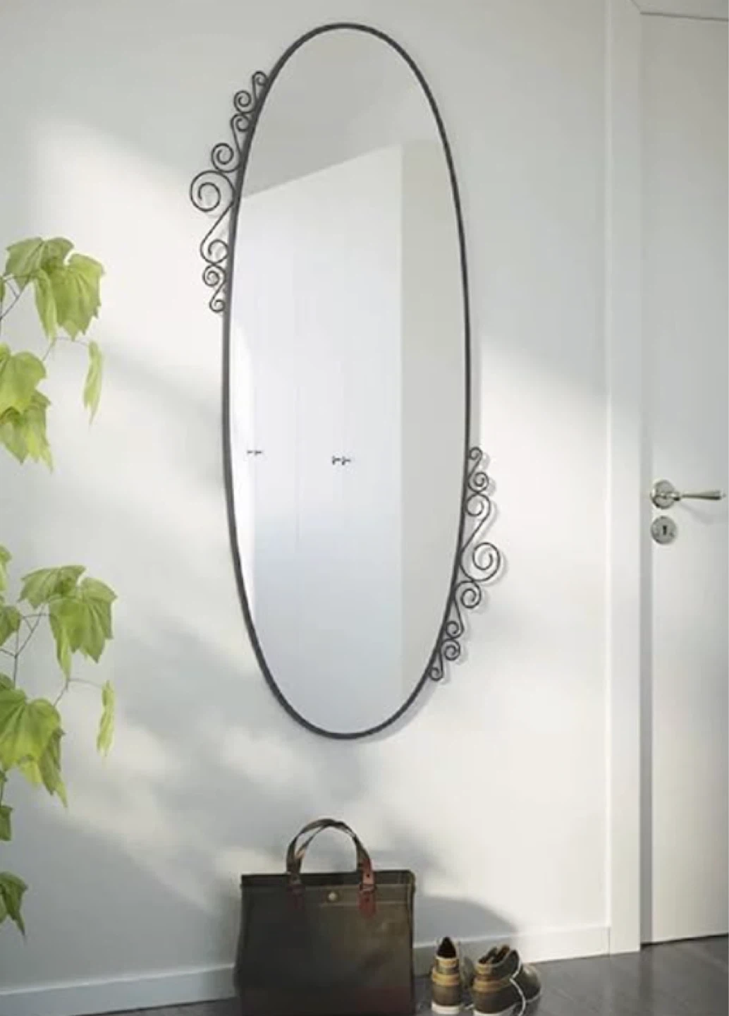 Oval Wall Mirror with Ornate Metal Frame