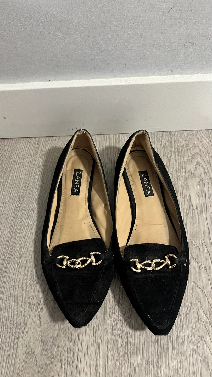 Zanea Black Suede Loafers with Gold Chain Detail