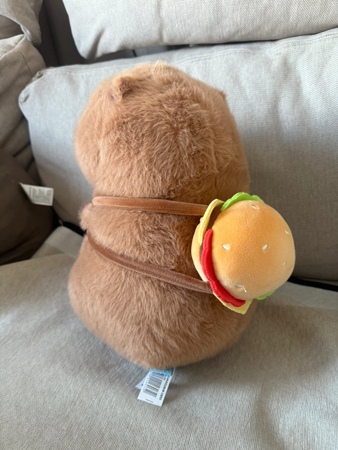 Capybara plush with hamburger accessory - photo 2