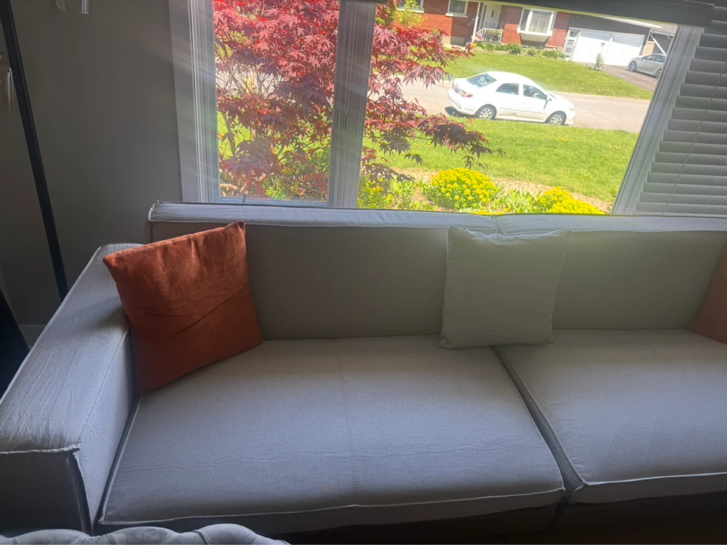 Large Light Grey Sofa with Wood Base