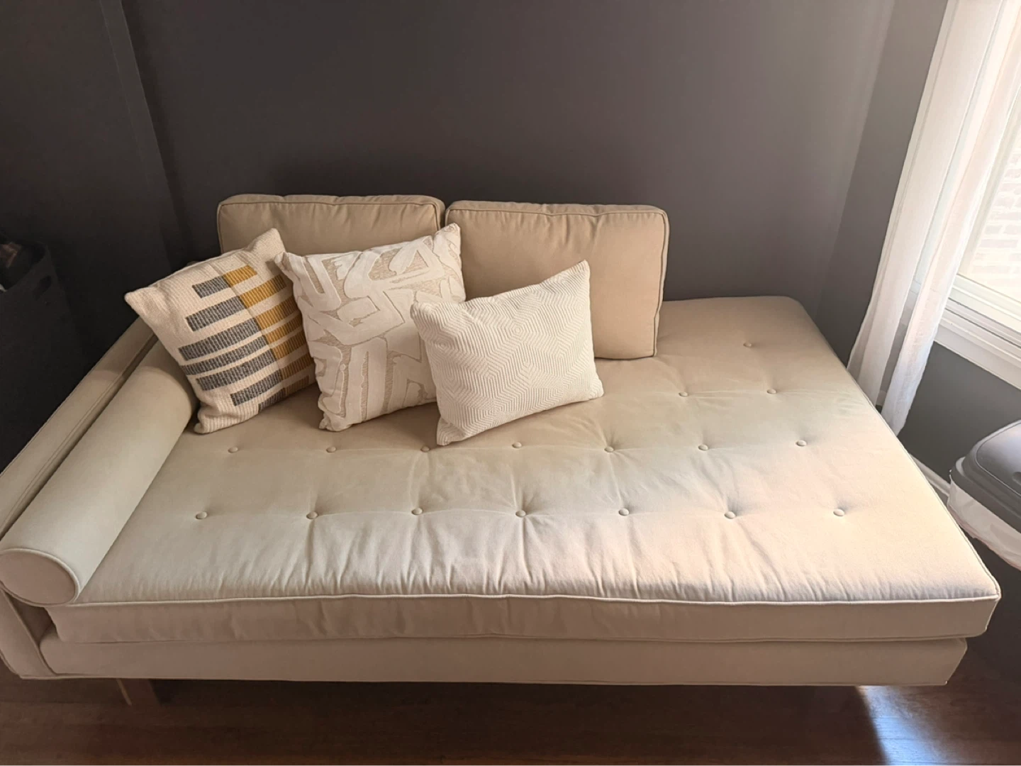 Beige Tufted Daybed with Bolster Pillow