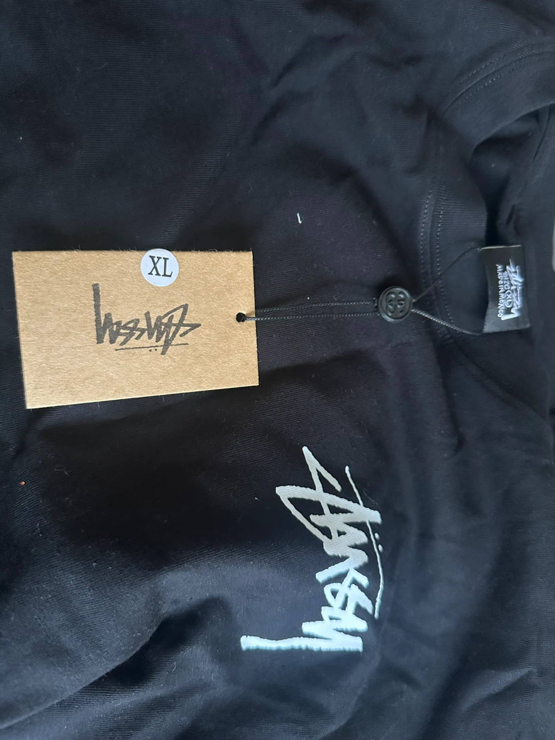 Stussy fits as a large