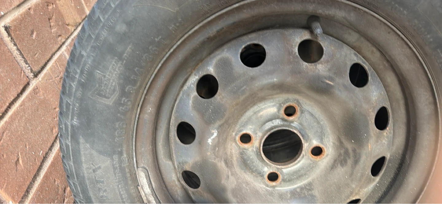 Set of 4 Tires and Hubcaps - photo 4